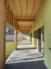 The portico with the visible joists